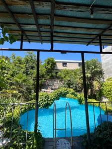 a view from the balcony of a pool at Mtskheta Oasis Garden in Mtskheta