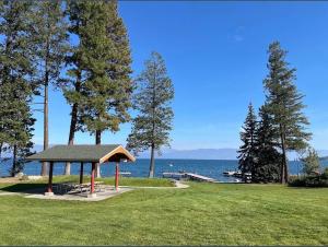 a gazebo in a park next to the water at Lakeview 4BR Huge Deck Dog Friendly ADA in Lakeside