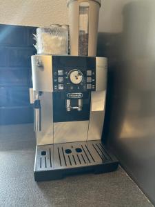 a coffee maker sitting on top of a table at Ferienwohnung AyNa 3, direkt an der Schweizer Grenze in Bad Säckingen +14 photos