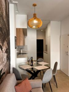 a dining room with a table and chairs at Roque Home Stay in La Mata