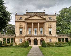 a large stone house with a grass yard at 1 Bed in Bath oc-bhr34 in Bath