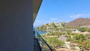 a view from the balcony of a condo overlooking the ocean at Zantamar Riviera Nayarit at La Cruz de Huanacaxtle in Cruz de Huanacaxtle