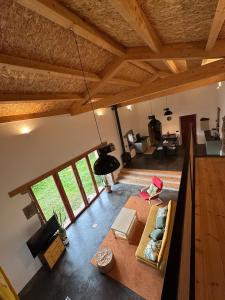 an overhead view of a living room with a couch at PASENIÑO - Aloxamento rural in Palas de Rei