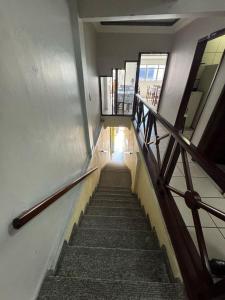 a staircase in a building with a stair case at hotel vitoria in Campina Grande