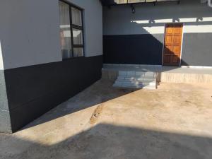 a door on the side of a building at Mypeace Comfort in Pretoria