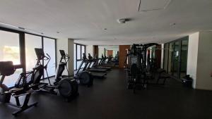 a gym with a row of treadmills and elliptical machines at Zantamar Riviera Nayarit at La Cruz de Huanacaxtle in Cruz de Huanacaxtle +38 photos