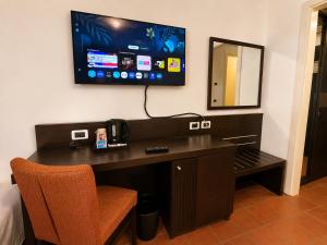 Televisor o centre d'entreteniment de Hotel Eurovil Panoramic View