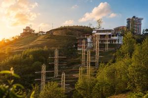 a hill with electricity transmission towers on it at Nagarkot Zip Coaster Pvt Ltd in Nagarkot