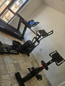 an overhead view of a gym with a treadmill at Waterfront Accommodations Villa 3B in Bijilo