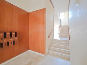 a staircase in a house with wooden walls and a stair case at Dimora Leccese in Lecce +71 photos