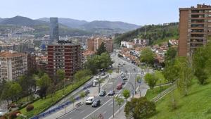 a view of a city with cars driving down a street at Bilbao Room 001 in Bilbao