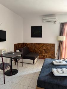 a living room with a couch and a table at Apartments Adriatik in Ulcinj