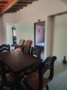 a conference room with a wooden table and chairs at El Renacer in San Gil