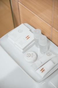 a table with white items on top of it at Hotel Rion in Mangalia +149 photos
