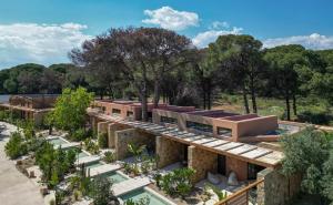 an architectural rendering of a building with trees in the background at Karidi Beach Gaia Retreat in Vourvourou
