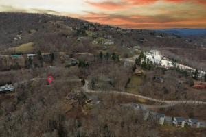 an aerial view of a small town in a forest at Appalachian Breeze in Blowing Rock