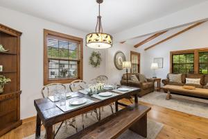 a living room with a table and chairs at Fehrway to Heaven in Blowing Rock