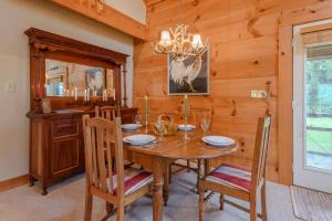 a dining room with a wooden table and chairs at Valle View in Valle Crucis