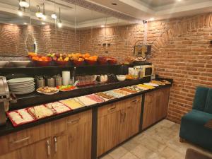 a buffet line with many different types of food at The Basilissis Gulhane in Istanbul
