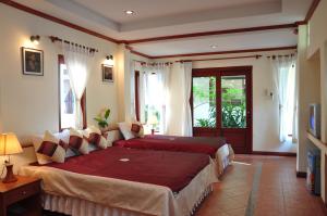 Ένα ή περισσότερα κρεβάτια σε δωμάτιο στο Samui Honey Cottages Beach Resort - SHA Extra Plus +85 φωτογραφίες