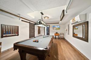 a billiard room with a pool table in it at Four Diamond Escape in Seven Devils