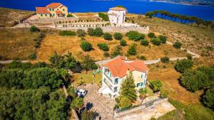 an aerial view of a house on a hill at Villa Rodothea in Khelmáta