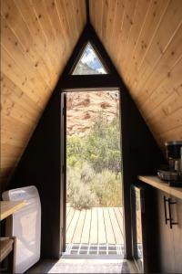 a door in a room with a window at NEW! Unique Modern Glamping Chalet #5 in Orderville