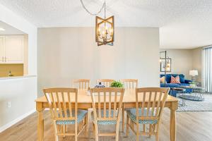 a dining room with a table and chairs at Sea Colony - 302S Edgewater in Bethany Beach