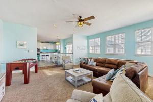 a living room with a couch and a table at Wedgefield -- 1 Wedgefield in Ocean View