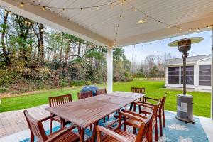 a wooden table and chairs on a patio at The Estuary - 26643 Weathervane Way in Frankford