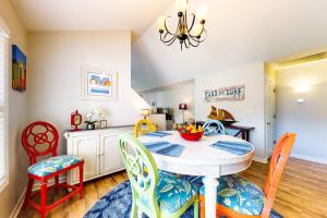 a dining room with a table and chairs at Forest Reach --- 33720 Chatham Way in Frankford