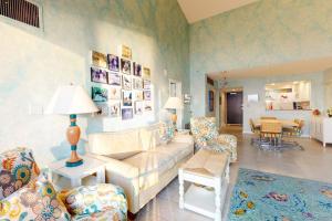 a living room with a couch and chairs and a table at Sea Colony - 904 Dover House Rd in Bethany Beach