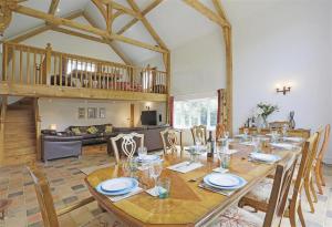 a large dining room with a table and chairs at 5 Bed in Beccles oc-ksf in Wangford