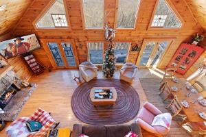 an overhead view of a living room in a log cabin at Cupids Retreat in Boone
