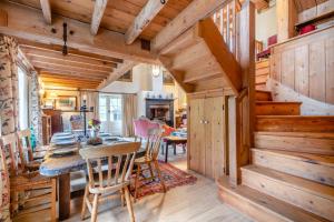 a log cabin dining room with a table and chairs at 4 Bed in Reepham oc-497 in Reepham