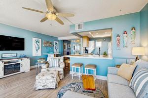 a living room with a couch and a kitchen at Sea Colony --- 508 Dover House Rd in Bethany Beach +32 photos