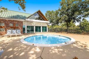 a small pool in front of a building at Bear Trap Dunes -- 13 Village Green in Ocean View
