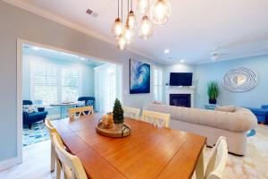 a living room with a table and a couch at Bayside Resort 2639zero Seabreeze Lndg in Selbyville