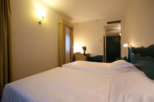Postel nebo postele na pokoji v ubytování Hotel Antico Mulino