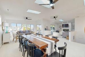 a kitchen and living room with a table and chairs at South Bethany --- 309 W 2nd St in Bethany Beach