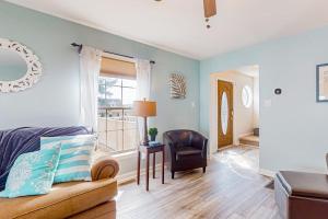 a living room with a couch and a chair at The Reservation --- 38601 Indian Trail in Ocean View