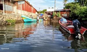 two boats are docked in a body of water at Poneloya Budget Accomodations in León +36 photos