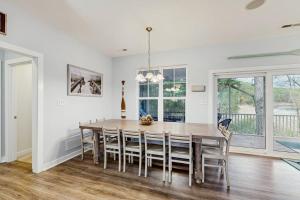 a dining room with a table and chairs at 39609 Waterworks Ct in Bethany Beach