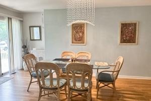 a dining room with a table and chairs at Sea Colony --- 55032 Pine Lake Dr in Bethany Beach