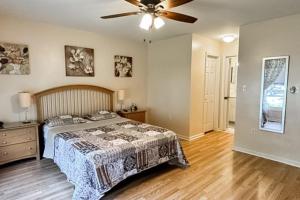 a bedroom with a bed and a ceiling fan at Sea Colony --- 55032 Pine Lake Dr in Bethany Beach