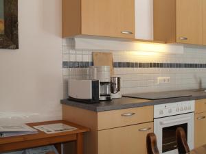 Kuchyňa alebo kuchynka v ubytovaní Apartments Stegmühle