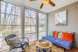 a living room with a couch and a table at Sea Colony - 55073 Pine Shore in Bethany Beach