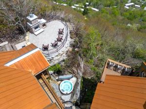 an aerial view of a house with a pool at On The Rocks Straight Up in Beech Mountain