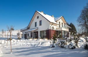 Apartamenty U Harrego I Przy Stawie Spa z klimatyzacją, balia, sauna, ogrodem i parkingiem v zime
