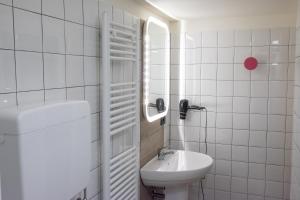 Kylpyhuone majoituspaikassa ViaBasso11 Guest House